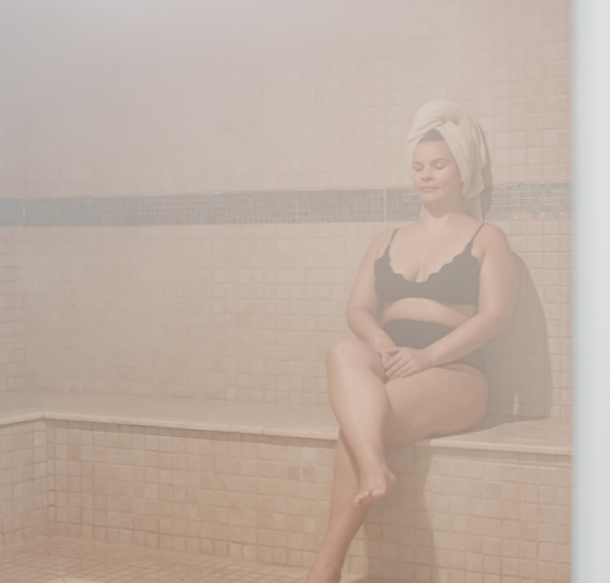 Lady in spa steam room